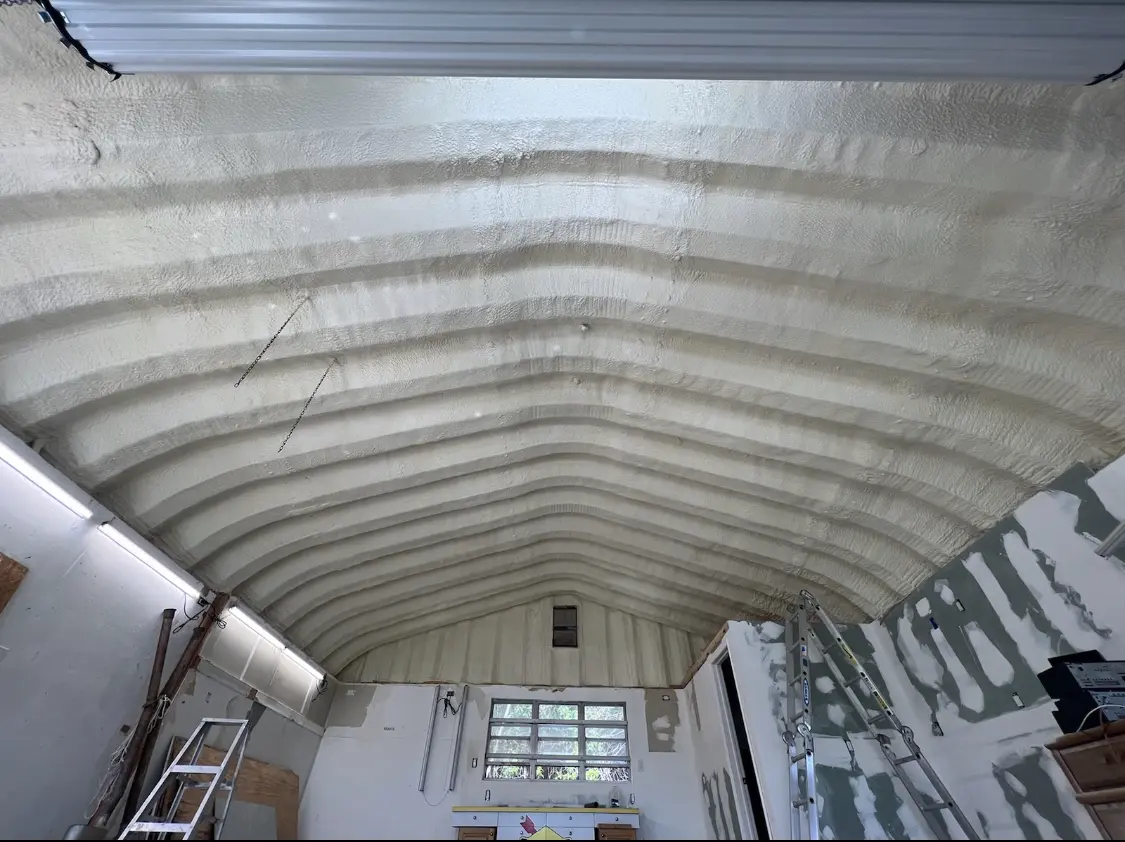Spray polyurethane foam applied to the underside of a metal roof deck in Lakeland South